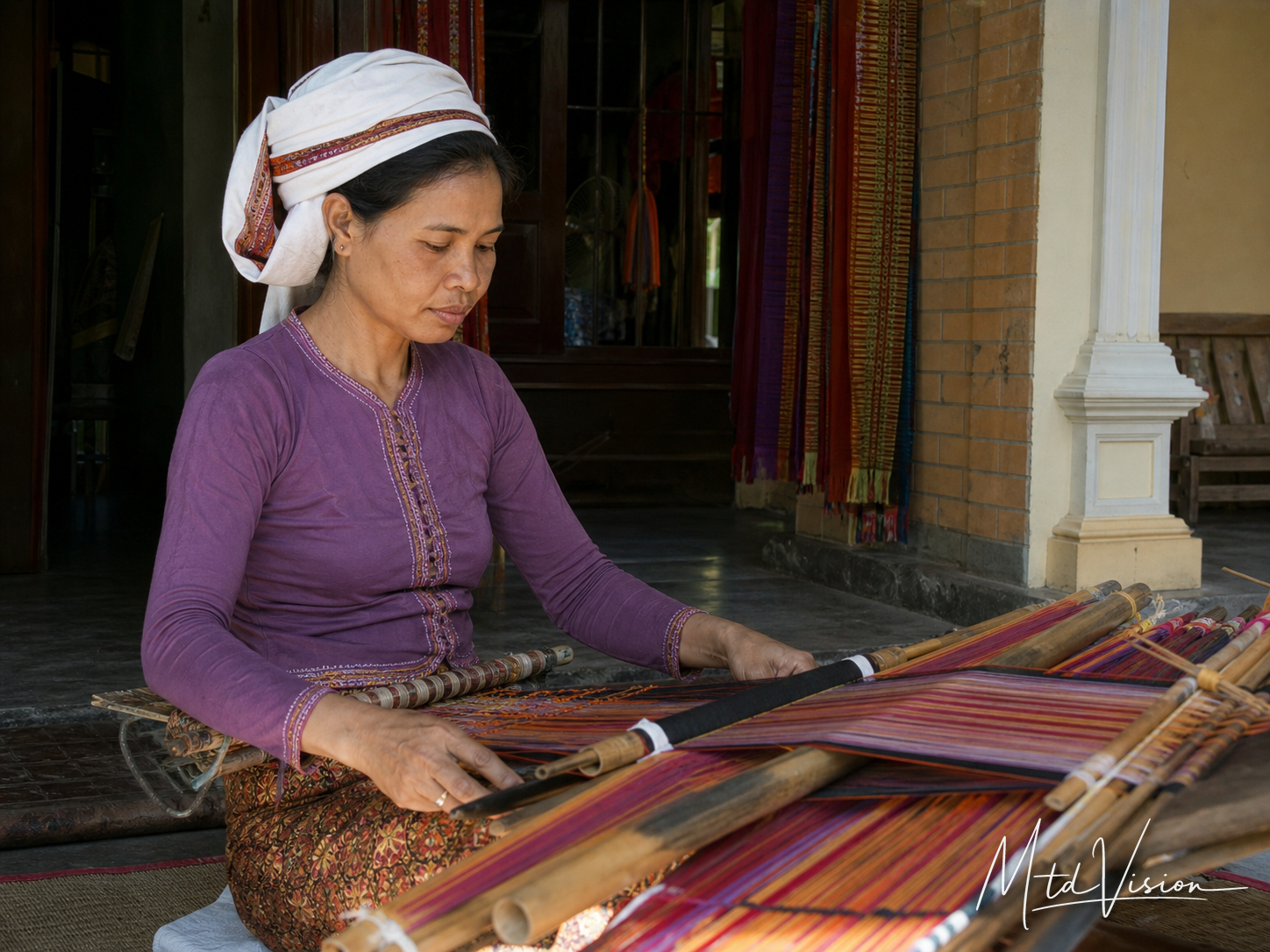 Member of the Cham people.