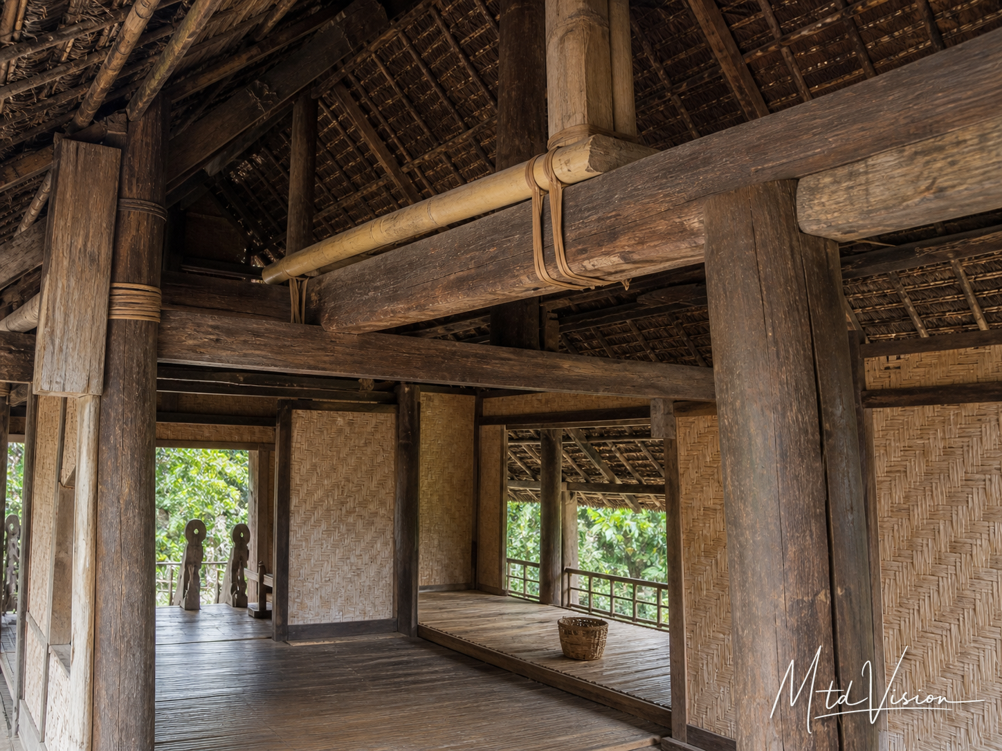 A wooden beam connecting the tops of opposite house posts and supporting the longitudinal roof member.
